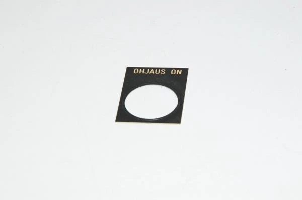 Legend plate, black, 30x40mm square, for 22mm switches / indicator lights "OHJAUS ON"
