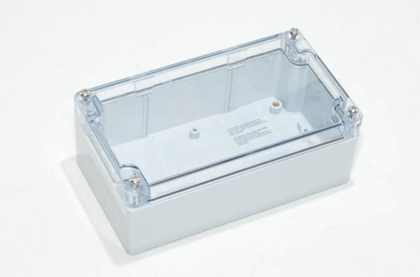 Hammond 1554J2GYCL 90x160x61mm elektroniikkalaitekotelo, polykarbonaatti, harmaa, läpinäkyvä luukku, IP66, IK07 *uusi*