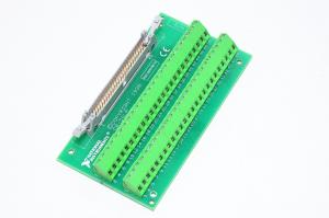 National Instruments CB-50LP interface module with 50x screw connection terminal blocks and 50pin ribbon cable connector