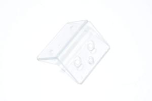 Muovinen L-mallinen asennuskiinnike 70x48x48mm jossa 2x 9.5mm, 2x 4mm, 1x 7.5mm reiät
